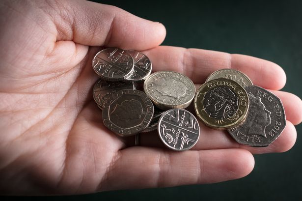 Coins in palm 