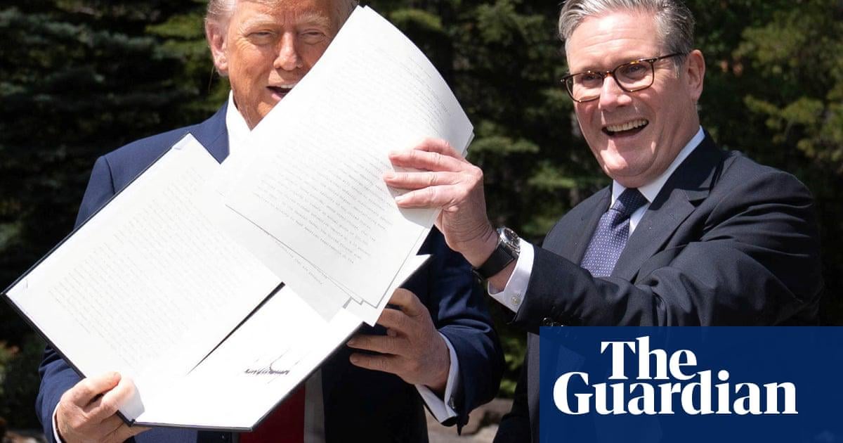 Trump says UK is protected from tariffs ‘because I like them’ as trade deal is signed off
