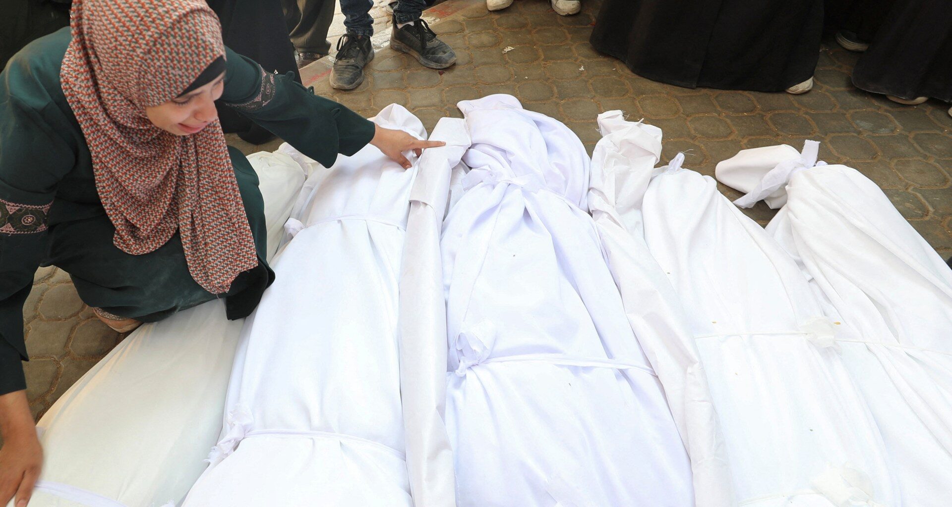 Israel kills more than 70 in Gaza, including 16 in bombing family building | Israel-Palestine conflict News