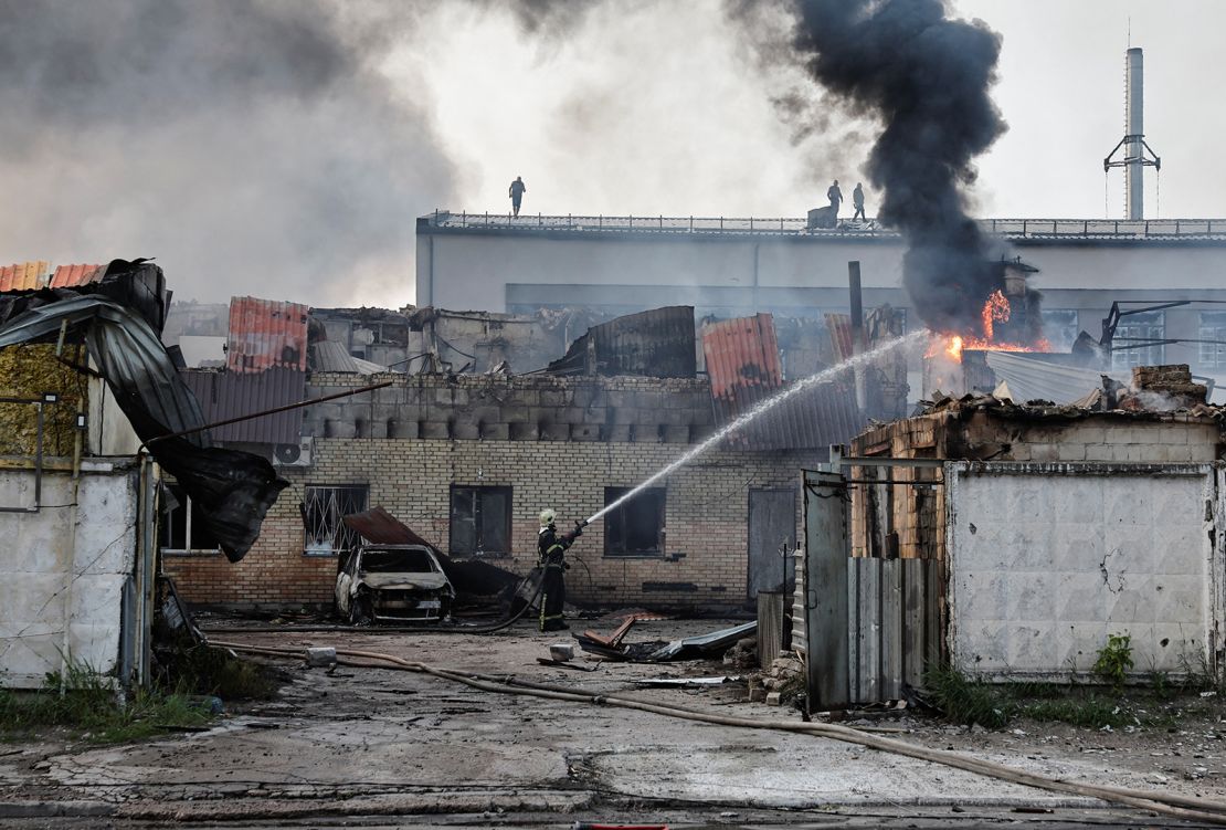 A firefighter works at the site of a Russian drone strike in Kyiv, Ukraine on June 10, 2025.