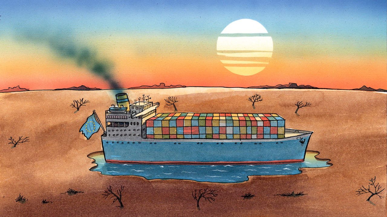 A container ship with a European flag stuck in a puddle in the middle of the desert.