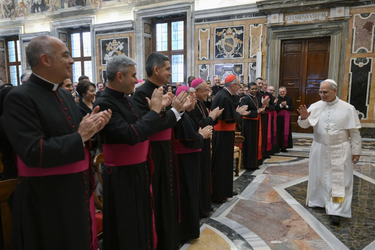 Pope Leo XIV greets members of the Vatican Secretariat of State on June 5, 2025, at the Vatican.