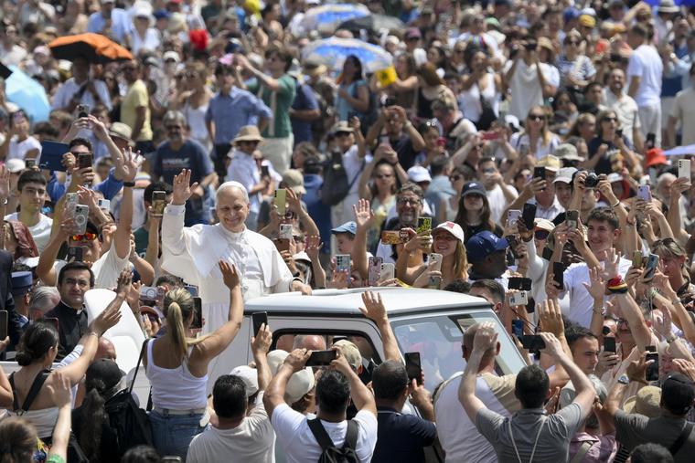 Pope Leo waves to the faithful in St. Peter’s Square on June 15.