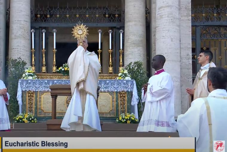 Pope Leo XIV blesses the faithful with the Blessed Sacrament outside of St. Mary Major in Rome, following Holy Mass and a Eucharistic procession through the streets of Rome.