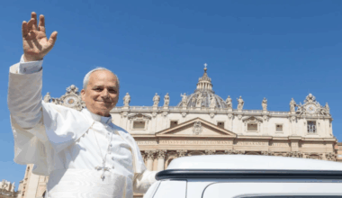 Pope Leo XIV waves from the popemobile at the crowds gathered in St. Peter's Square for Mass on Pentecost Sunday on June 8, 2025.