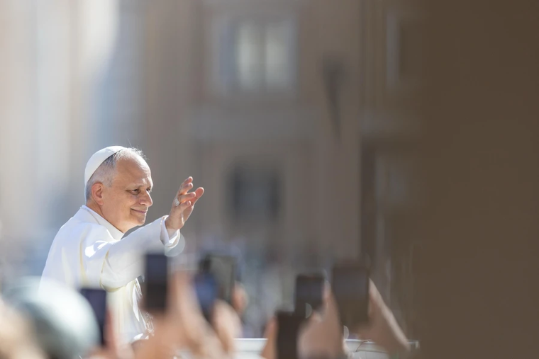 Pope Leo XIV waves to pilgrims at the Wednesday general audience in St. Peter's Square, Wednesday, June 25, 2025