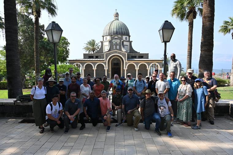 The veteran contingent gathers in front of the Church of the Beatitudes.