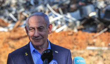 Israeli Prime Minister Benjamin Netanyahu smiles.
