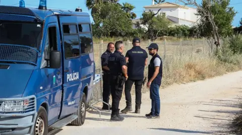 JOAO MATOS/EPA-EFE/Shutterstock Portuguese authorities during a search operation in an area between the cities of Lagos and Praia da Luz for Madeleine McCann, in Lagos