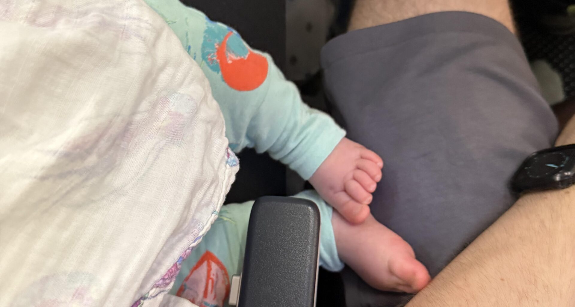 On a flight and a passenger keeps putting his bare feet on me.