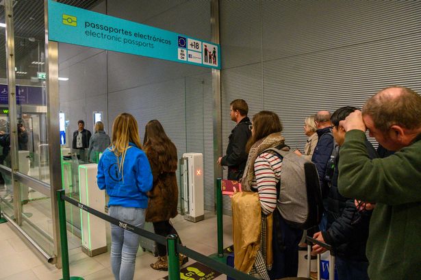 Arriving passengers go through e-gates for Automated Border Control at a new area, provided by ANA - Aeroportos de Portugal