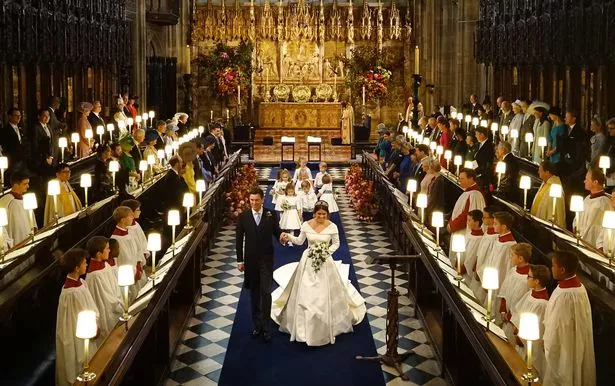 Eugenie and Jack walk down the aisle