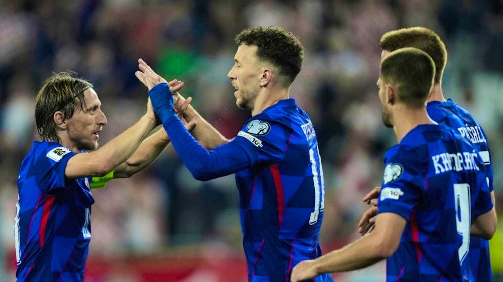 Italy fulfill their duty at Spalletti's farewell - Gallery. Ivan Perisic (right) and Luka Modric high-five: The two veterans are still indispensable for Croatia
