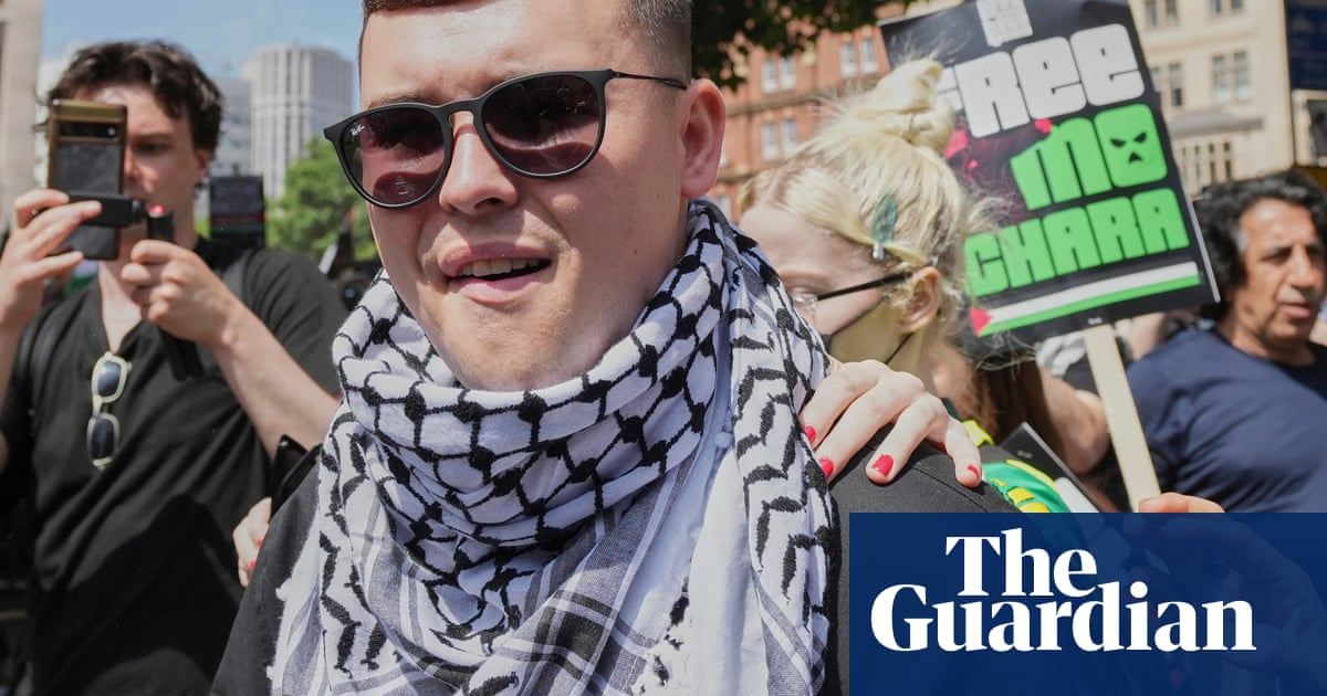 Kneecap rapper charged with terror offence released on unconditional bail | UK news