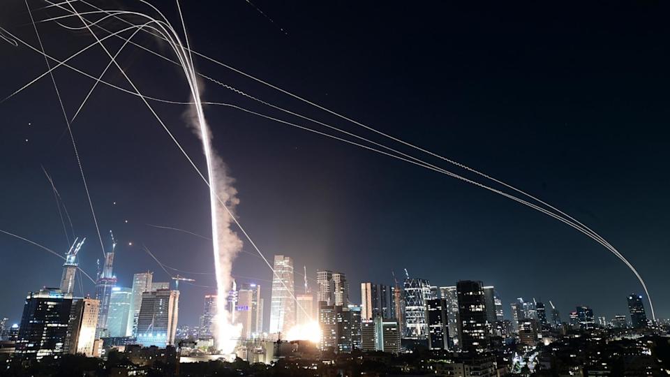 PHOTO: Israeli Iron Dome air defense system fires to intercept missiles over Tel Aviv, Israel, June 13, 2025.  (Tomer Neuberg/AP)