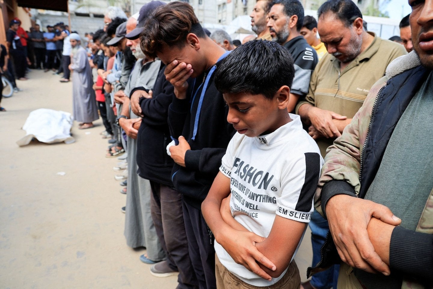 Israel says it fired ‘warning shots’ near aid site; health officials say 27 dead