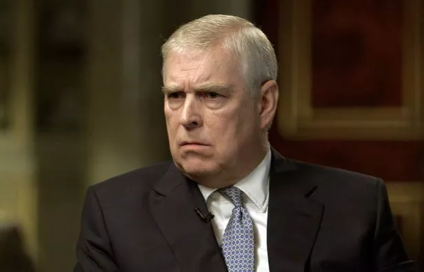 Prince Andrew, in a black blazer, white shirt and blue tie, pulls an angry facial expression during his Newsnight interview in 2019