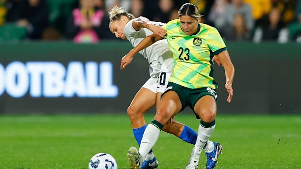 The Matildas' Kyra Cooney-Cross Slovenia's Dominika Conc contest for the ball.