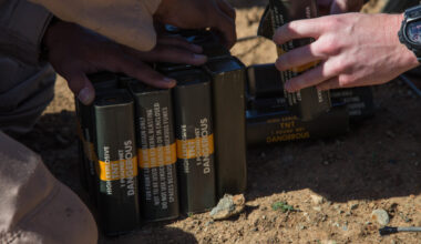 U.S. Marines with 1st Explosive Ordnance Disposal Company, 7th Engineer Support Battalion, 1st Marine Logistics Group, partner with Orange County Sheriff’s Department Hazardous Devices Section to set explosive charges during the Post-Blast Analysis Course at Camp Pendleton, Calif., April 11, 2018. The Marines and sheriffs prepare charges of trinitrotoluene (TNT) to be placed in the ground before detonation. (U.S. Marine Corps Photo by Lance Cpl. Quentarius Johnson)