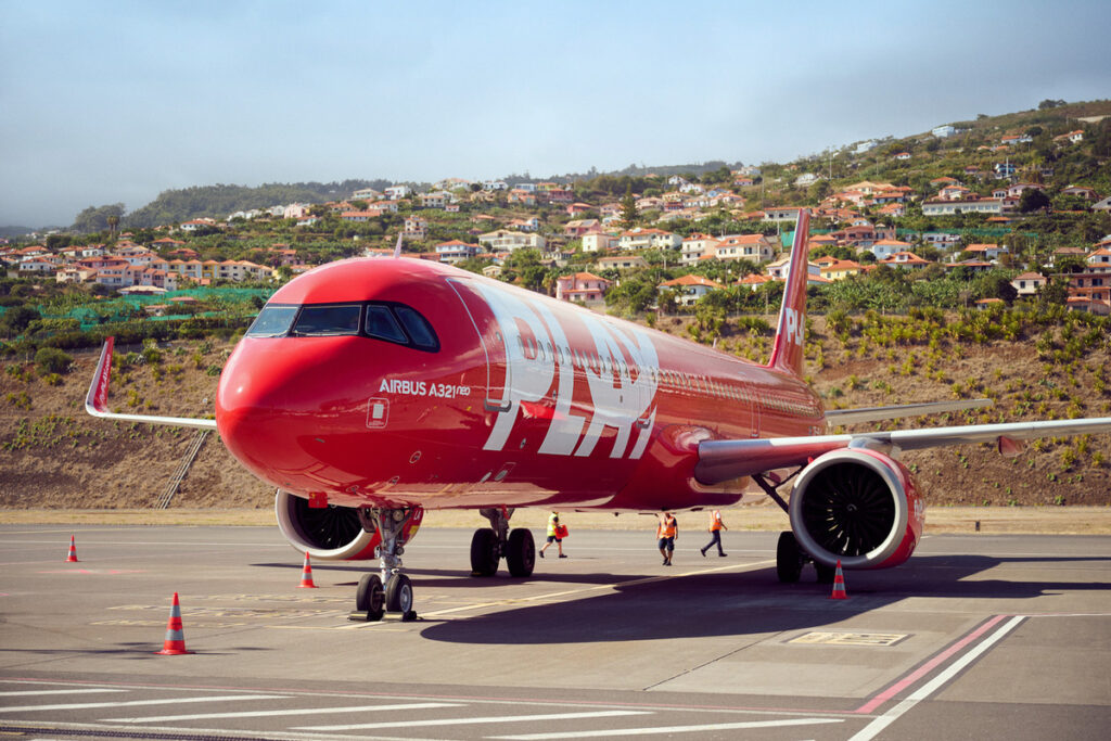 A PLAY Airbus parked on the tarmac.