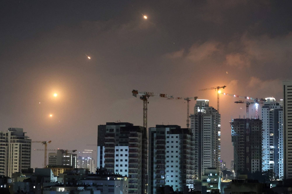 Israel and Iran trade barrages as Tehran's nuclear program targeted