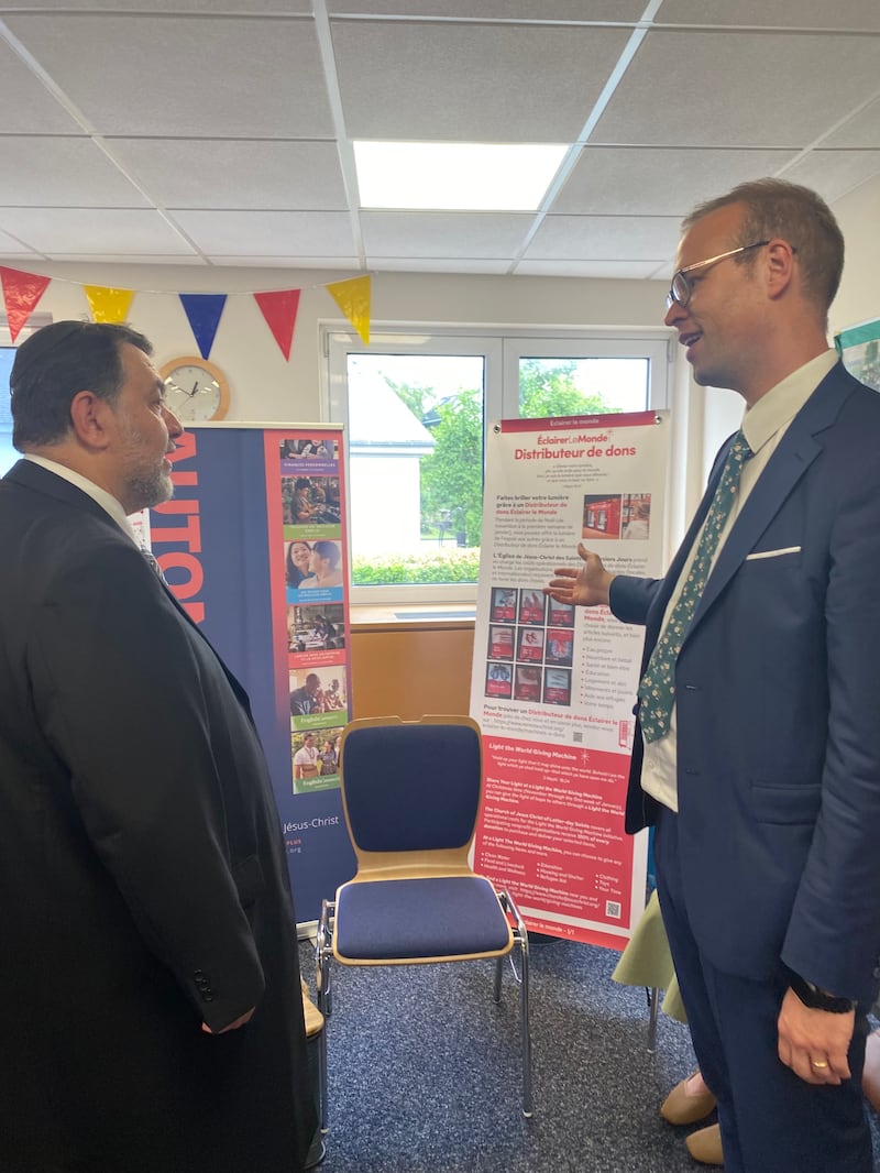 Michaël Ulrich, President of the Nancy France Stake (right), introduces Chief Rabbi Alain Nacache to some of the Church’s welfare and community projects during an open house held June 14-15, 2025, for the Church's first meetinghouse in Luxembourg.
