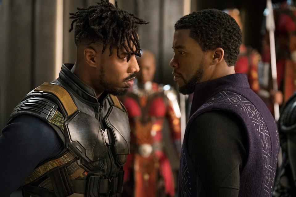 FILE - Michael B. Jordan as Erik Killmonger, left, and Chadwick Boseman as T'Challa, right, in "Black Panther."