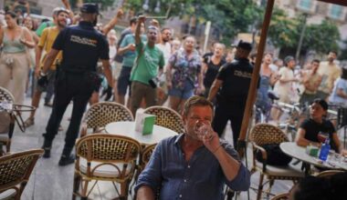 A tourist during an anti-tourist protest in Barcelona yesterday