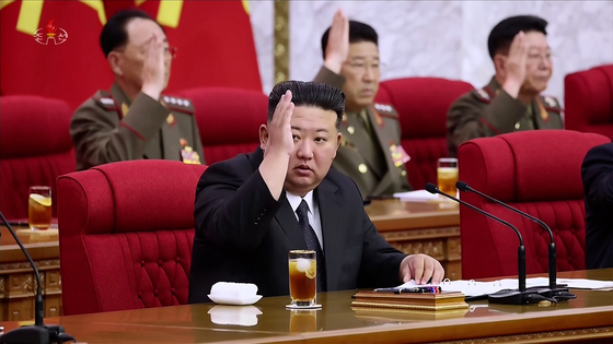 This photo, carried by North Korea's official Korean Central News Agency on June 24, shows the North's leader Kim Jong-un presiding over the 12th plenary meeting of the eighth Central Committee of the ruling Workers' Party of Korea, which took place from June 21 to 23. [YONHAP]