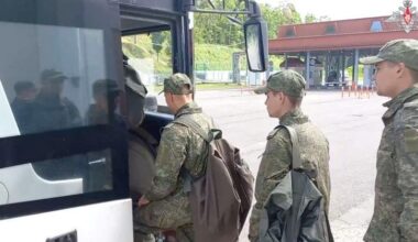 Russian younger POWs board bus in Belarus after release from Ukraine | U.S. & World