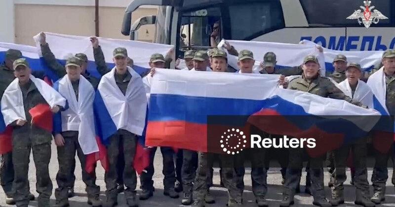 Russian POWs board buses in Belarus after release from Ukraine | U.S. & World
