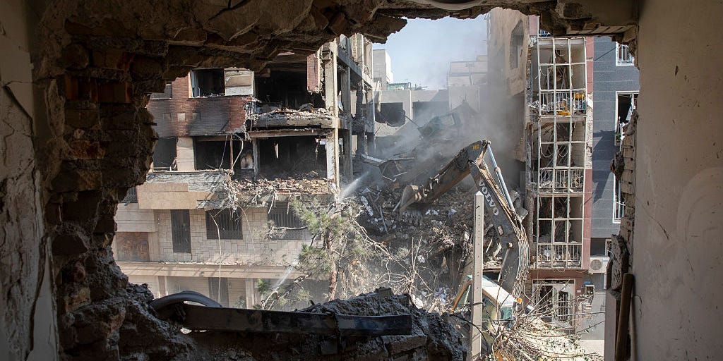 Israel-Iran War: Photos Show Aftermath of Airstrikes and Missiles