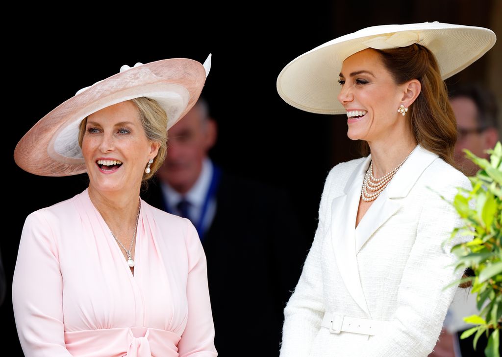 Sophie and Kate laughing on Garter Day