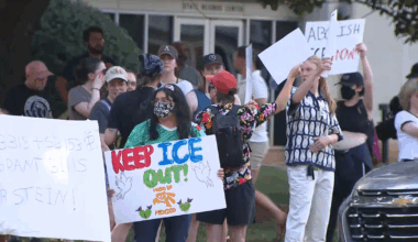 Dozens of protesters gather outside governor's mansion, urging Stein to veto immigration bills :: WRAL.com