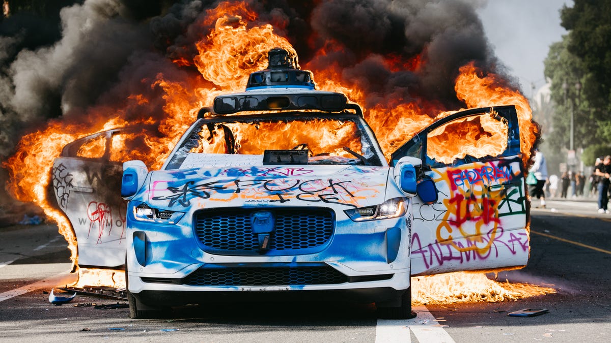 Waymo cars set on fire in LA protests; service suspended