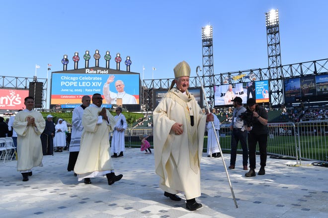 Cardinal Blase J. Cupich, Archbishop of Chicago, walks off the field during the Archdiocese of ChicagoÕs Catholic mass as it concludes at Rate Field, home of the Chicago White Sox.