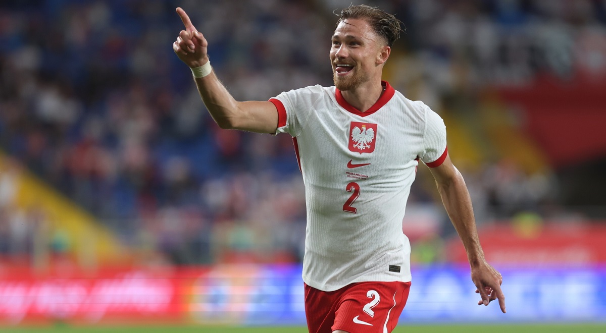 Aston Villa defender Matty Cash celebrates scoring for Poland against Moldova on Friday night.