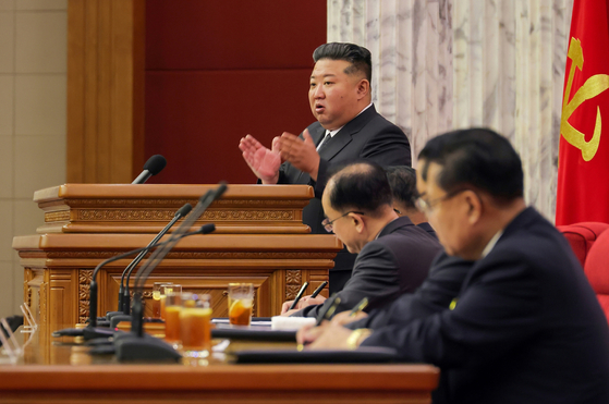 This photo, carried by North Korea's official Korean Central News Agency on June 24, shows the North's leader Kim Jong-un presiding over the 12th plenary meeting of the eighth Central Committee of the ruling Workers' Party of Korea, which took place from June 21 to 23. [YONHAP]