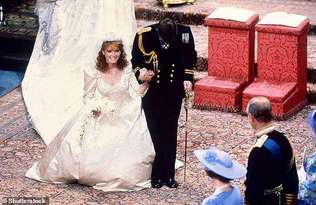 The Duchess of York wearing the York tiara and Prince Andrew both bow and curtsey to Queen Elizabeth II