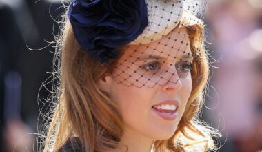 Princess Beatrice's silky red hair looks SO long as she expertly styles a blazer