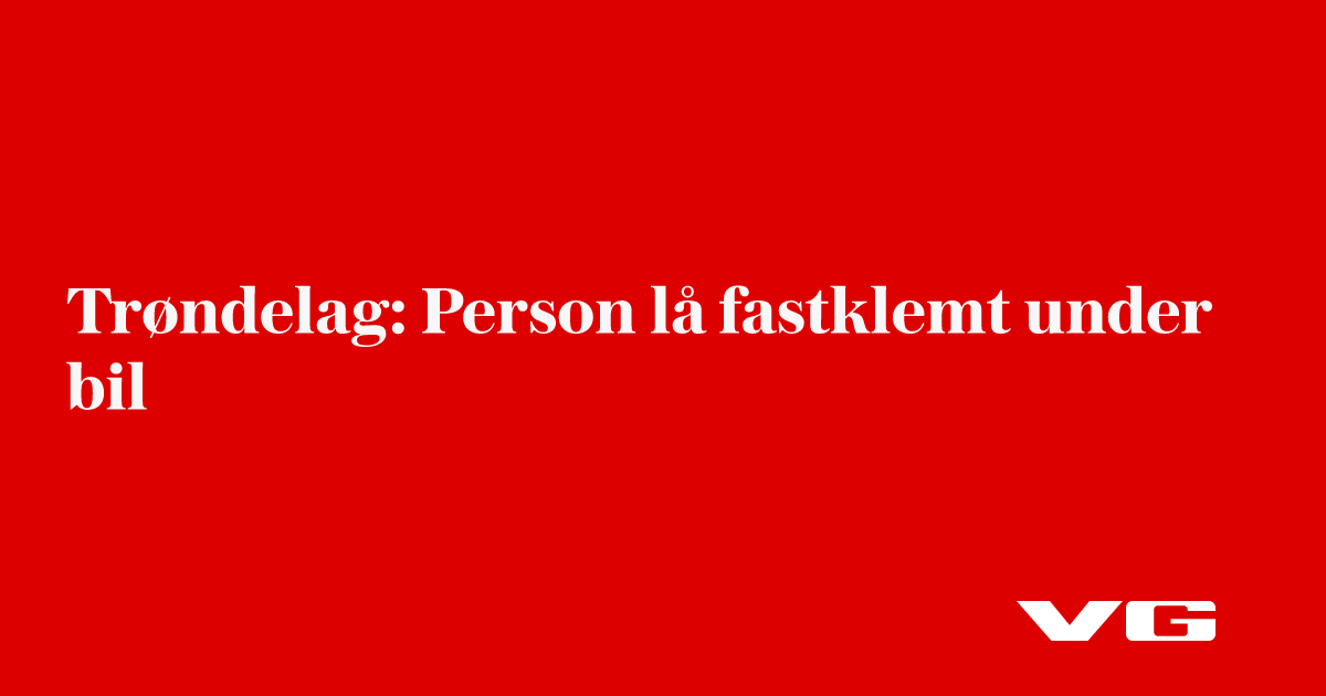 Person lå fastklemt under bil