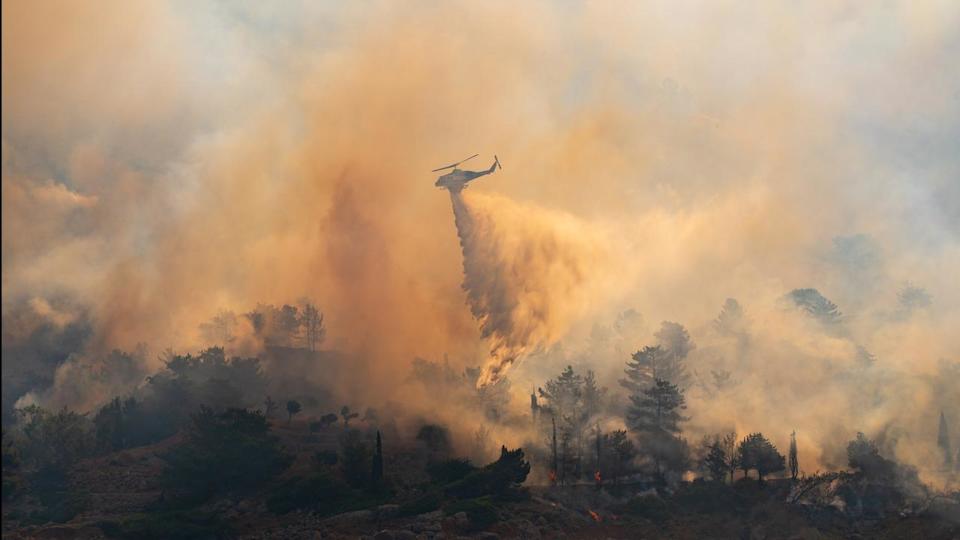 Helicopter during firefighting operations on Chios Island, Greece