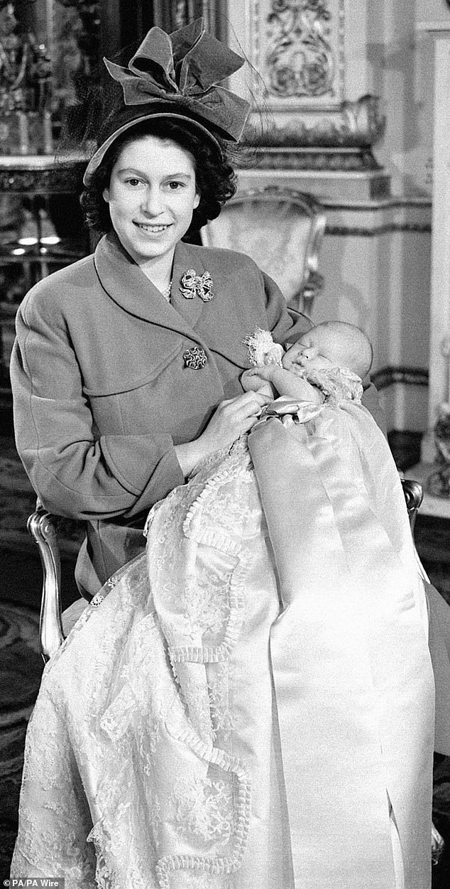The late Queen Elizabeth II with a baby King Charles in 1948