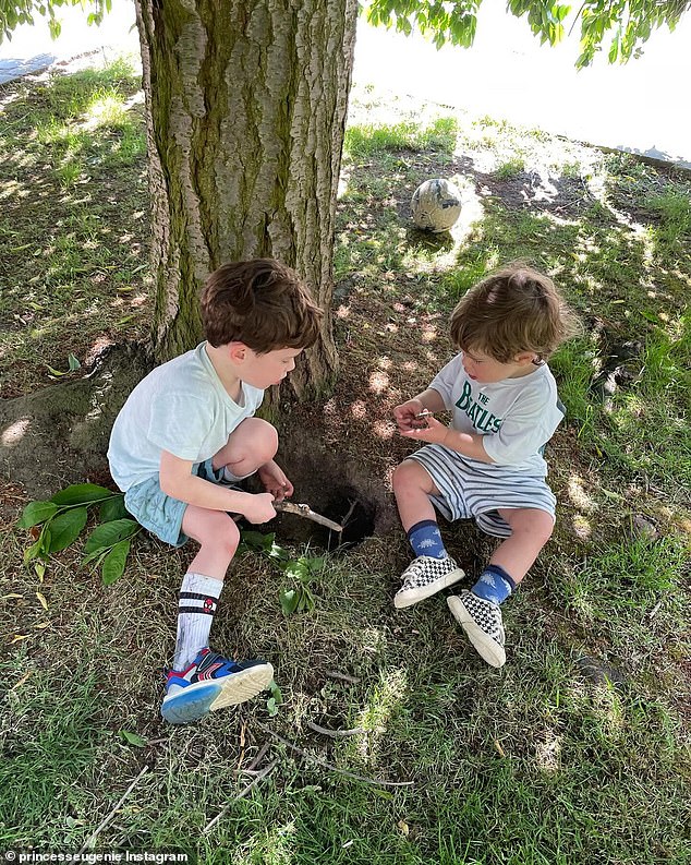 The brothers sit underneath a tree in a never-before-seen photograph shared by Eugenie