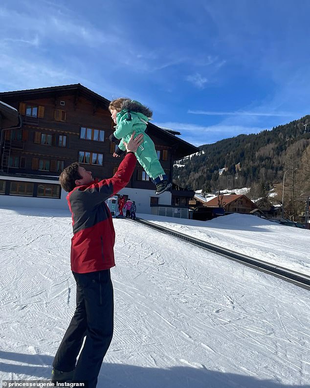 In one photograph, Ernest - who is the second son of Eugenie and her husband Jack Brooksbank - is thrown into the air by his father while on a snowy ski trip