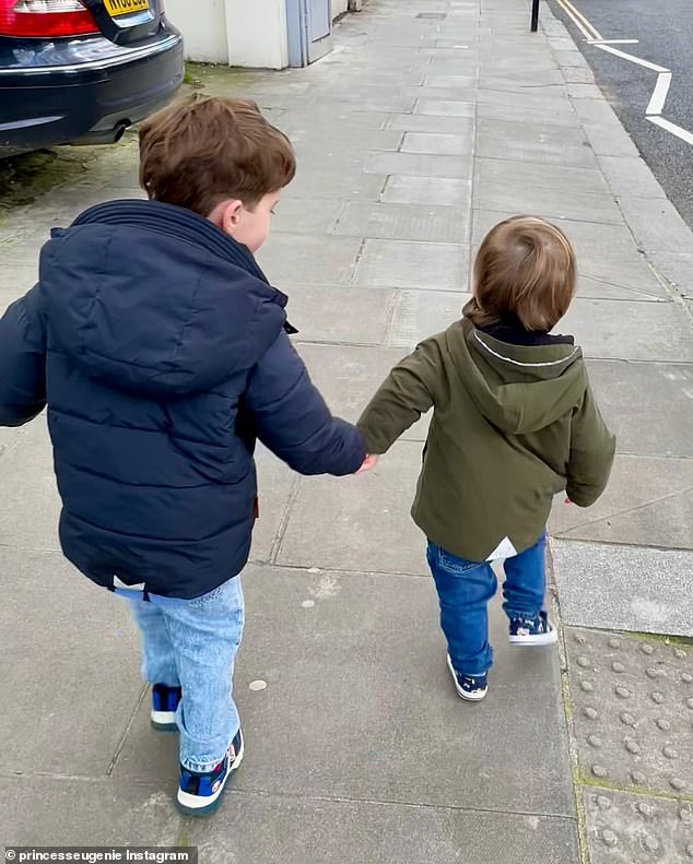 In other pictures from the rare snapshot, Ernie and August are seen holding hands as they walk down a street in London, with another picturing them together on an airplane