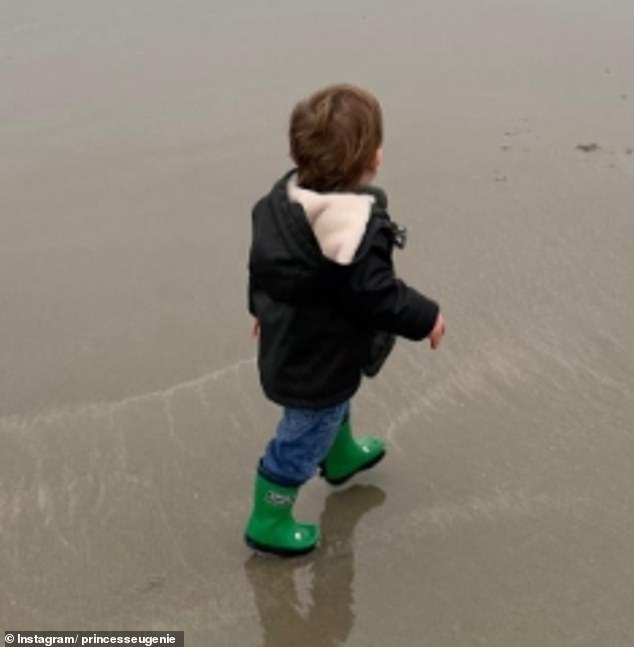The royal also added an adorable image of her youngest son enjoying a stroll at the beach in the Instagram post