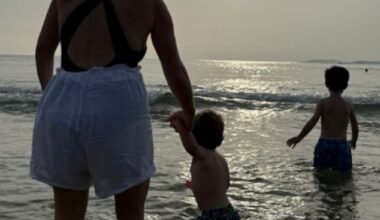 Princess Eugenie shared a photograph of herself at the beach with her sons August and Ernest for World Ocean Day on Sunday (pictured from L to R: Eugenie, Ernest, August)