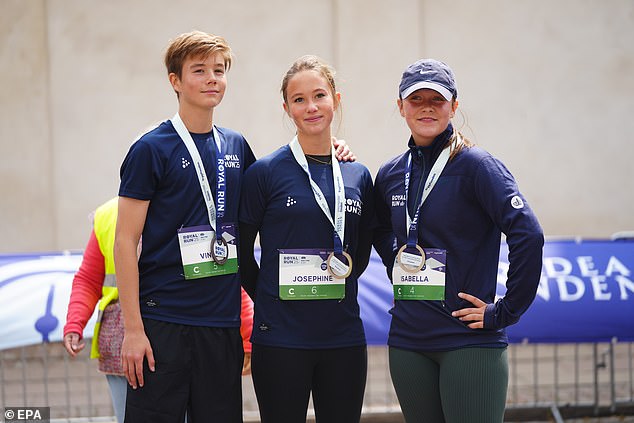 Their sisters - Princesses Isabella, (right) 18, and Josephine, 14 (centre) - too beamed as they participated in a day of sports in athletic wear, with all the royals understood to have started from a different city