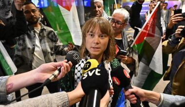 Swedish activist Greta Thunberg talks to journalists as she arrives at Arlanda airport outside Stockholm